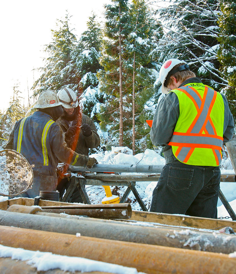 Staff in the field in snow