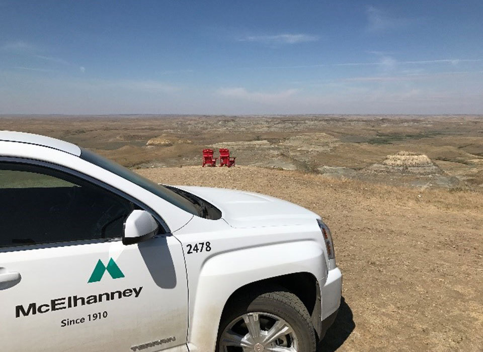 McElhanney Truck with red chairs in background