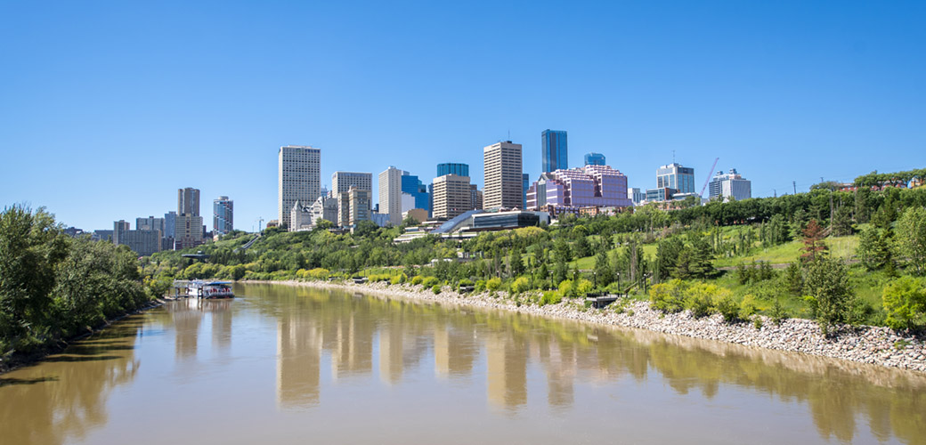 The city of Edmonton in the background with the North Saskatchewan River in the foreground.
