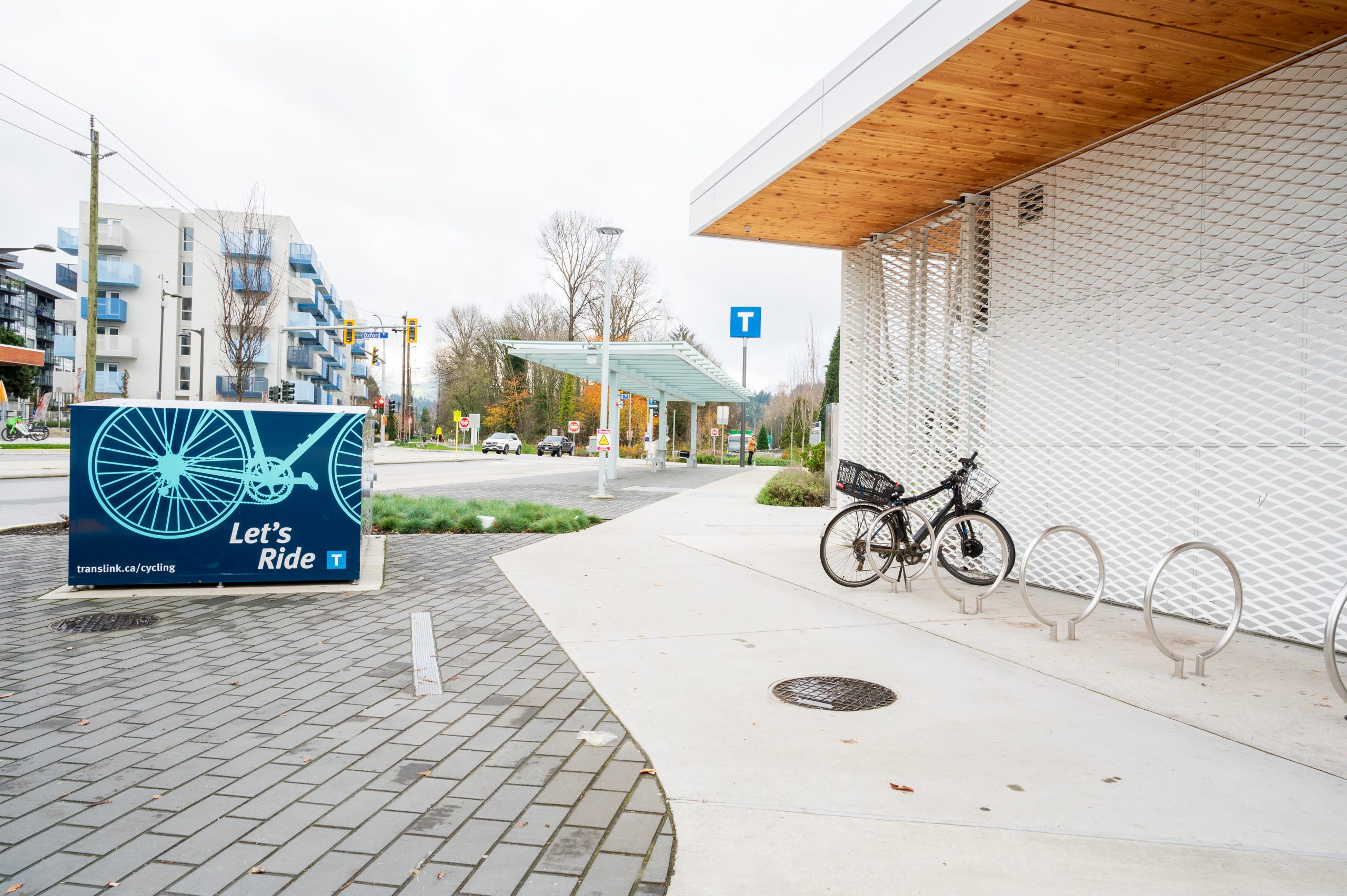 Bike parking and pedestrian pathway near the station building at the Phibbs Transit Exchange.