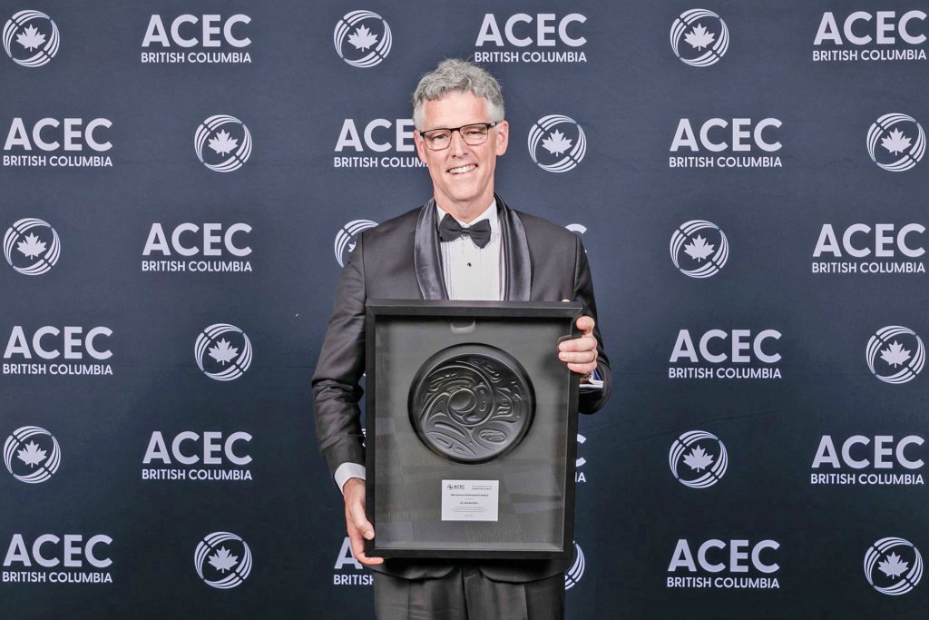 Allan with award