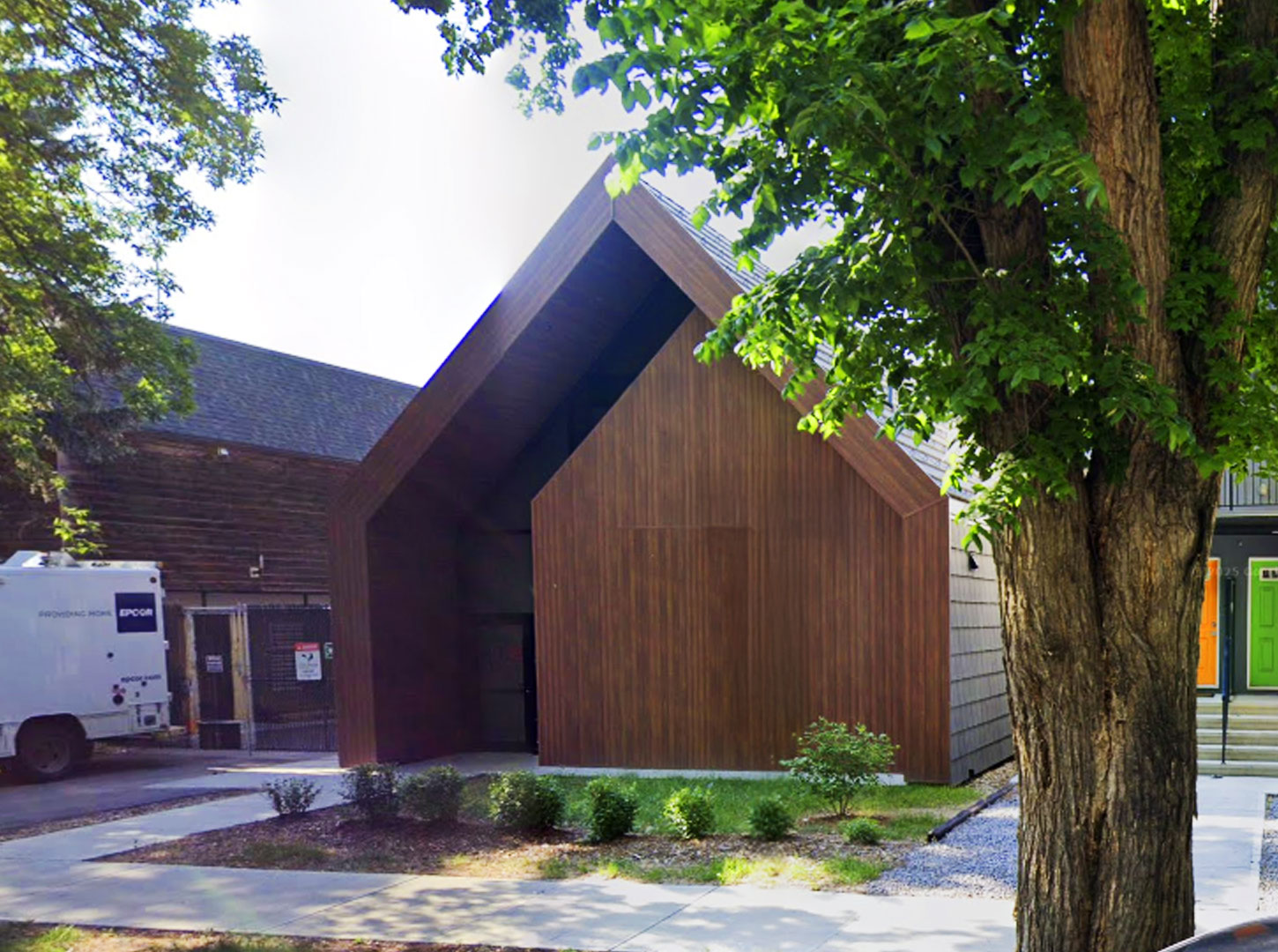 EPCOR Garneau Substation Oblique View An oblique view of the EPCOR Garneau Substation, featuring its modern wood-clad structure amidst urban surroundings.