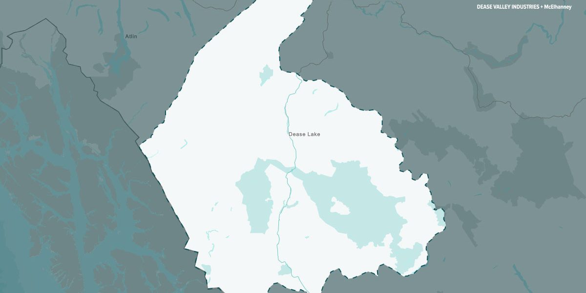 Map highlighting a white‑shaded region centered on Dease Lake in northern British Columbia, with surrounding towns labeled in grey.