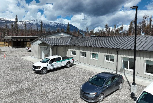 Caribou Conservation Breeding Centre Facility Administration Building Exterior view of a building at the Caribou Conservation Breeding Centre with a second structure visible behind it.
