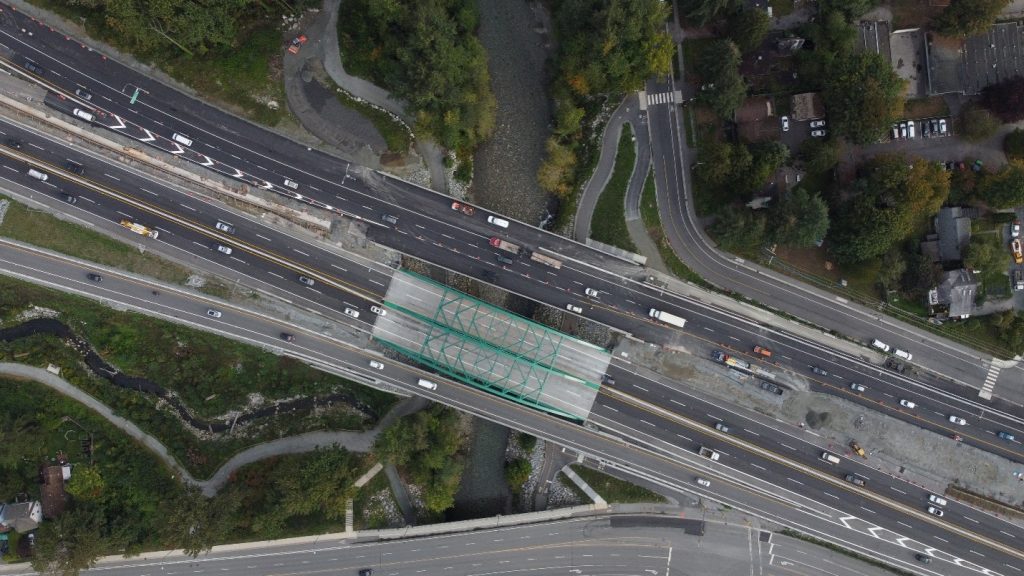Aerial view of the Lynn Creek Bridge corridor with conceptual bridge renewal and seismic retrofit design supporting long-term transportation infrastructure resilience.