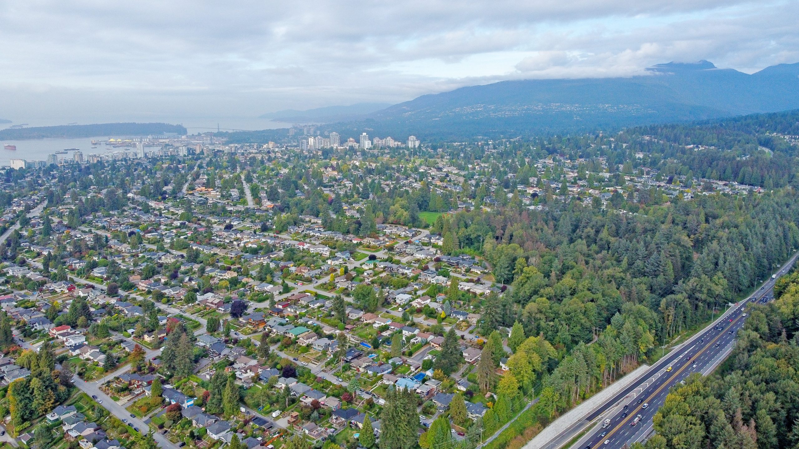residential neighbourhoods and infrastructure in North Vancouver Aerial view of residential neighbourhoods and infrastructure in North Vancouver, British Columbia.