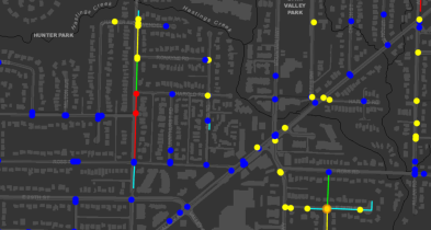 GIS map displaying watermain replacement priorities across the District of North Vancouver.