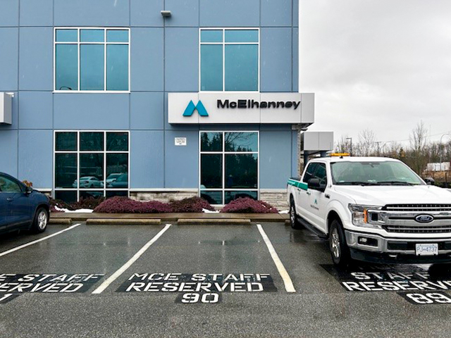McElhanney’s Langley office Corporate office frontage with a truck in a parking spot.