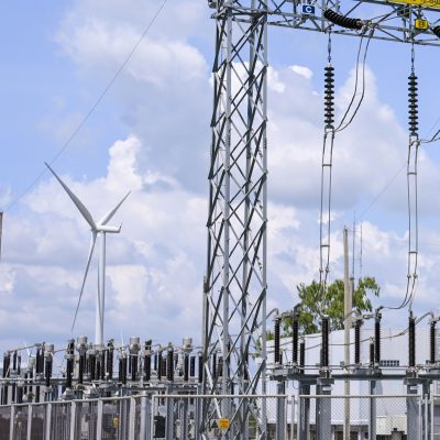 Electrical,Substation,Wind,Turbine,Power,Line,Blue,Sky,Green,Grass Electrical substation wind turbine power line blue sky green grass