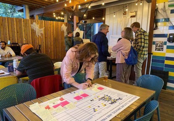 Residents discussing future growth options during a community planning workshop.